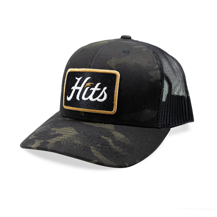 camoflage trucker hat with black hits logo on front